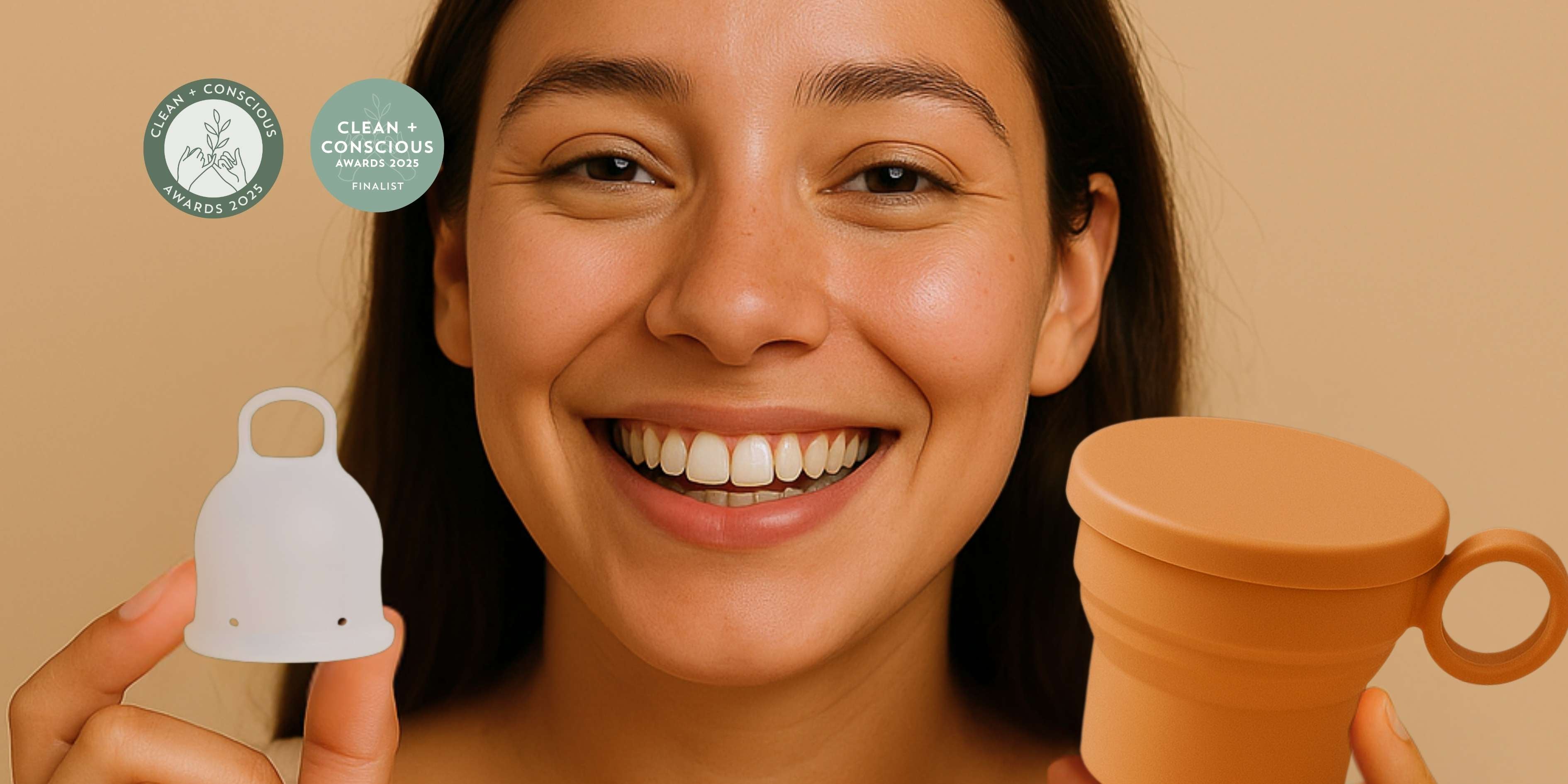 A woman holding Inoya period cup with a menstrual cup steriliser 