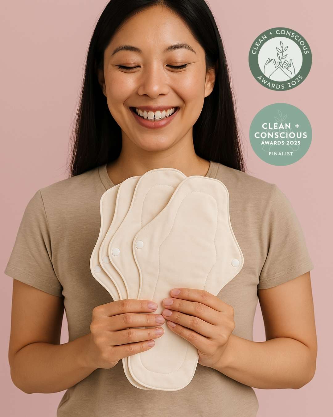 A woman holding reusable pads for period 