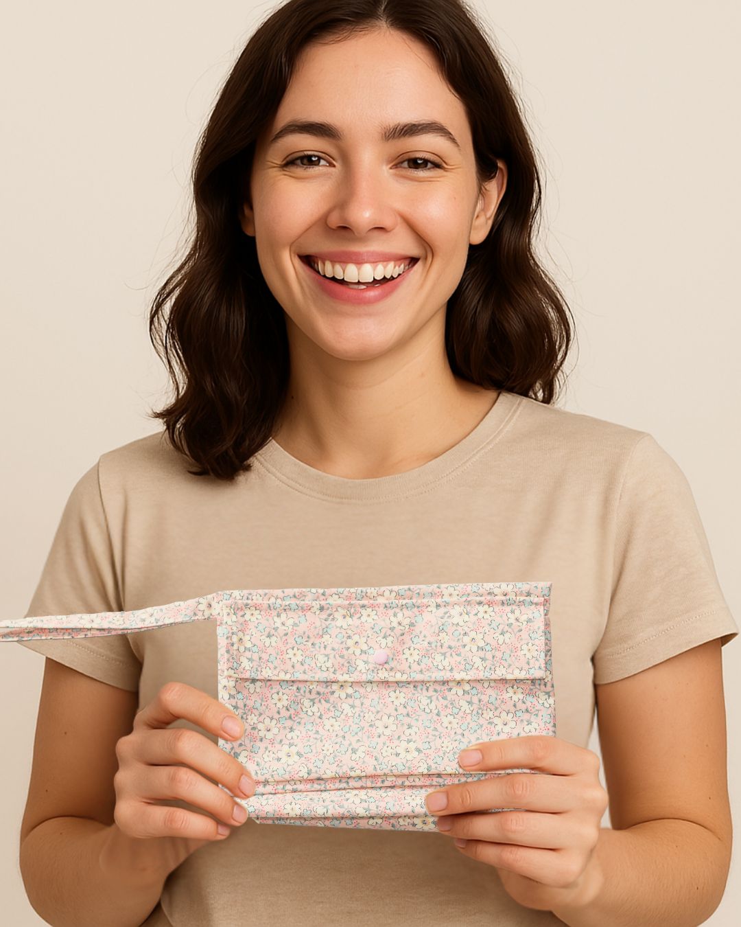 A woman holding Inoya wet bag